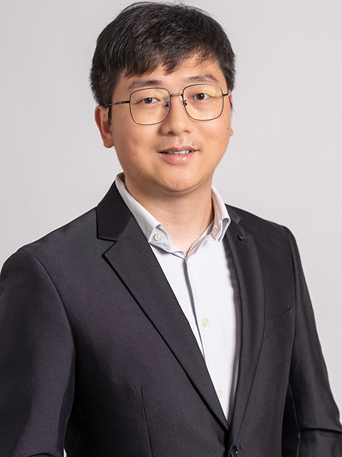 Portrait photograph of ABCE staff member, Cheng Zhang